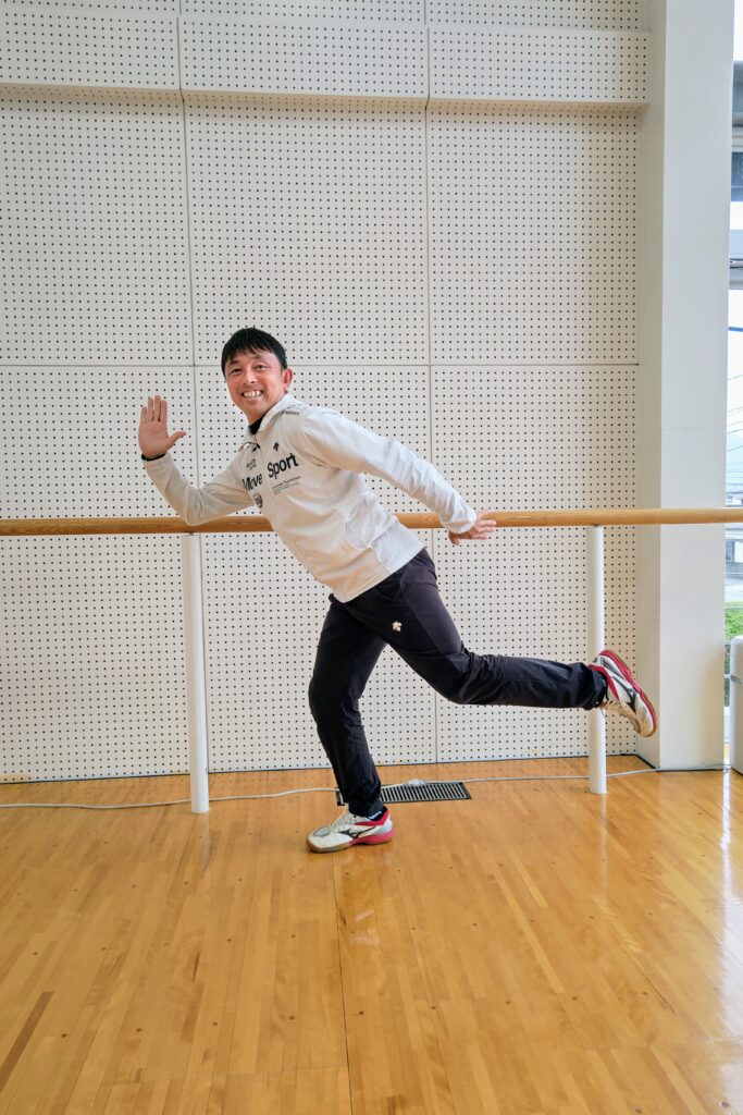 野間　靖智