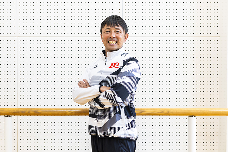 野間　靖智